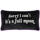 A rectangular black plush throw pillow with purple piping and white embroidered text that reads 'Sorry I can't it's a full moon' on a plain white background.