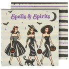 A square paper napkin with a vintage Halloween illustration reading 'Spells & Spirits,' showing three women in black dresses, pumpkins, bats, stars, and a crescent moon. A second napkin with black-and-white horizontal stripes and purple lines is partially visible behind it on a white background.