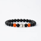 For Virgo Black beaded bracelet with orange carnelian beads on a white background