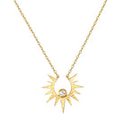 Gold necklace with a sun-shaped pendant on a white background