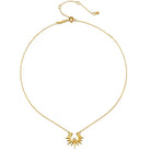 A delicate gold chain necklace featuring a small sunburst pendant with a central clear gemstone, displayed on a clean white background.