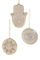 Decorative hanging items with Hamsa hand, sun, and eye designs on a white background.