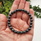 Hematite Faceted Bracelet Up Close On Hand