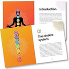 Booklet on chakras with colorful illustrations and text on a white background