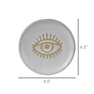 Round ceramic dish with eye design and measurements on a white background