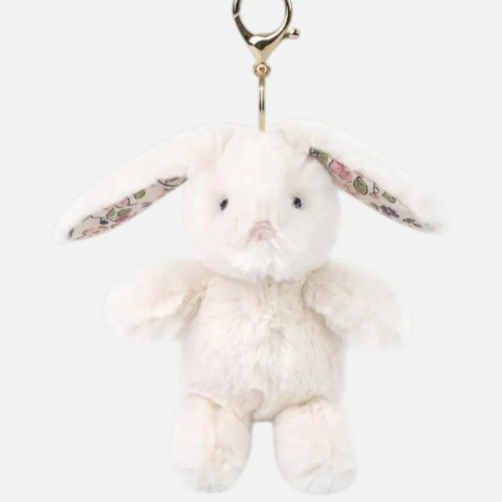 Plush bunny keychain with floral details on a white background