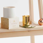 Frasier Fir Gold Votive accenting a room