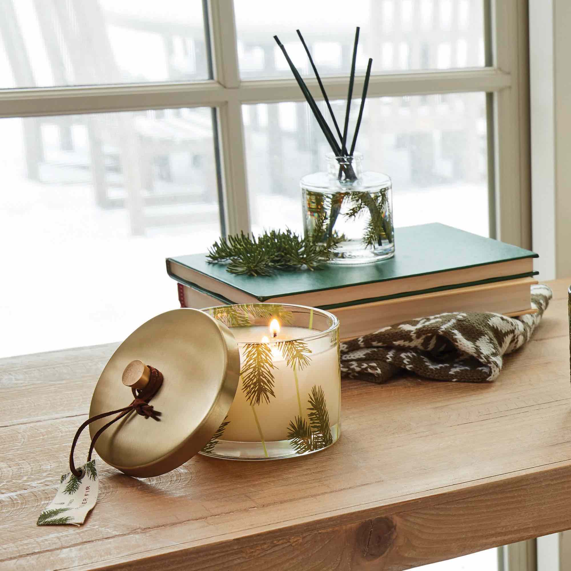 Frasier Fir Petite Pine Needle Reed Diffuser on a table