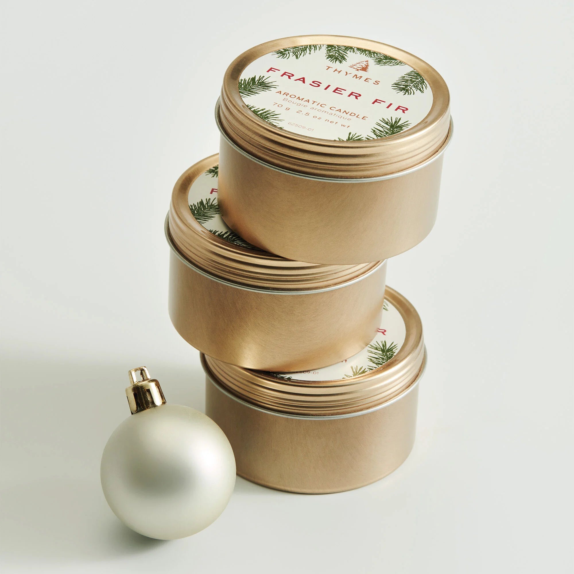 Frasier Fir Travel Tin Candle with an ornament (not included)