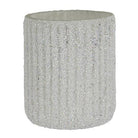 Silver glittery cylindrical candle holder on a white background