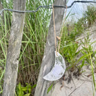 Hanging Selenite Moon on Jute on Fence