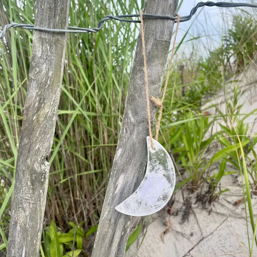 Hanging Selenite Moon on Jute on Fence