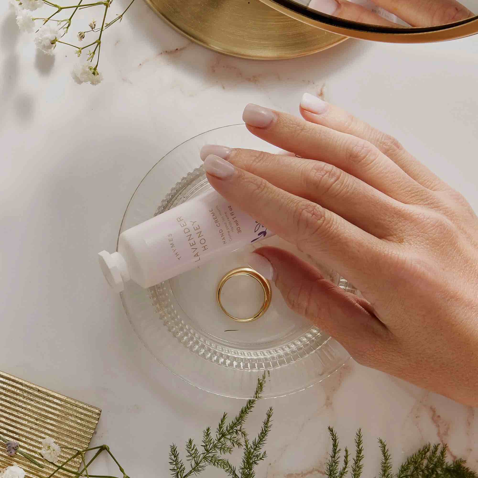 Lavender Honey Petite Hand Cream with a hand