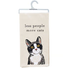 Towel with a cat illustration and text 'less people more cats' on a hanger.