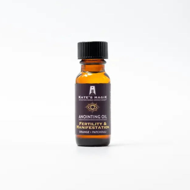 Fertility & Manifestation Anointing oil bottle with black cap and label on a white background