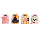 Four Halloween-themed plastic accessories in blister packaging, including a pink bat, a black witch hat, orange and white 'BOO' letters, and a white skull.
