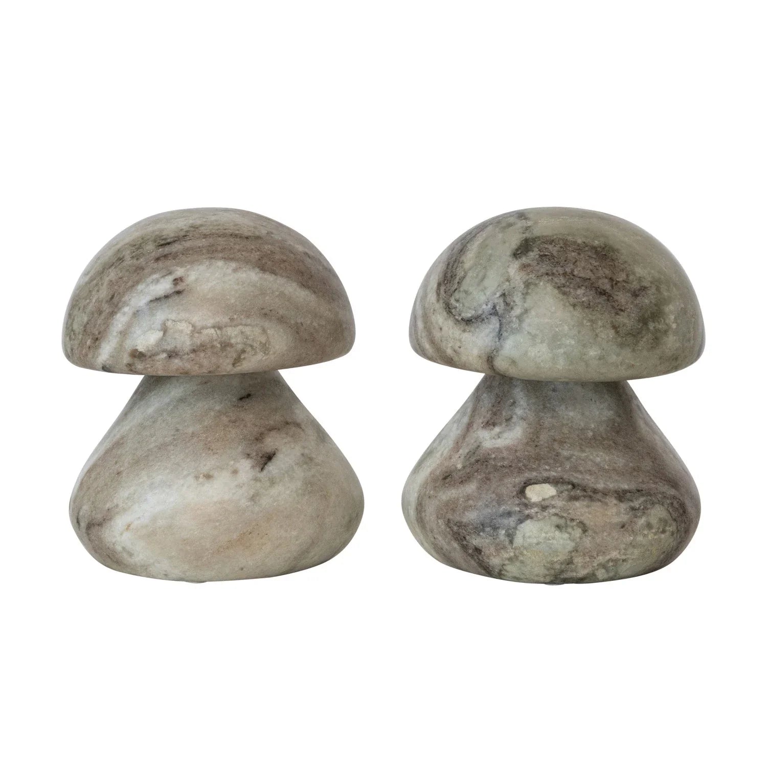 Two stone mushroom sculptures on a white background