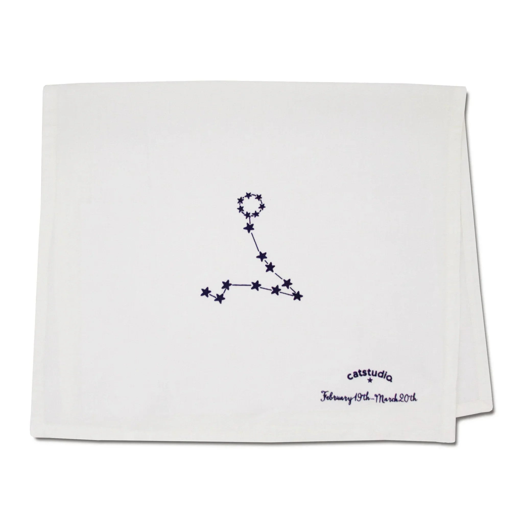 White towel with a star constellation design and text on a white background