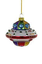 Colorful UFO-shaped Christmas ornament on a white background