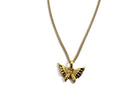 Gold butterfly pendant necklace on a white background