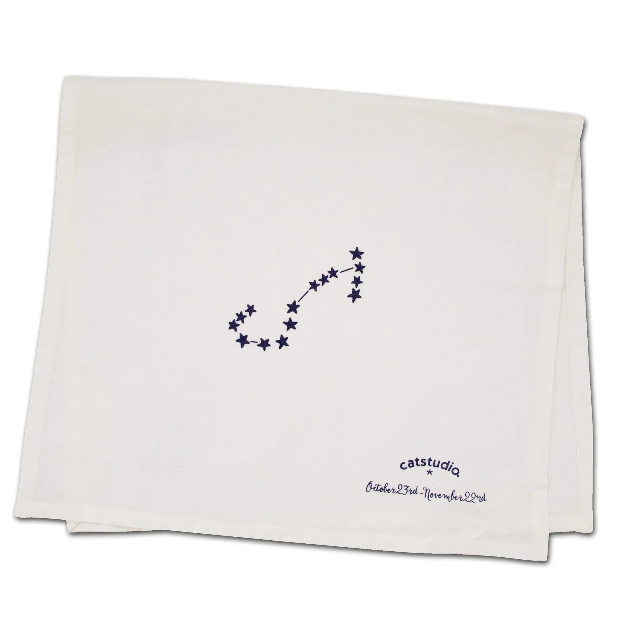 White towel with star constellation design and 'catstudio' branding on a white background
