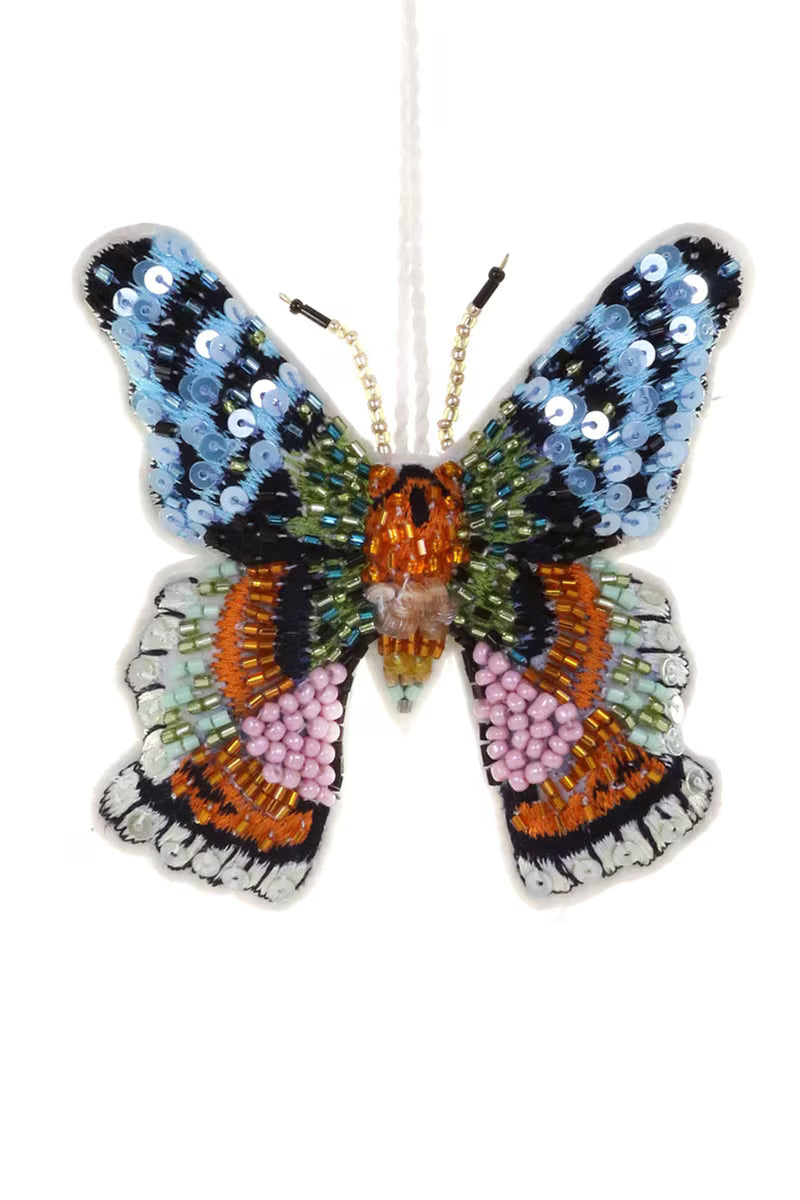 Shimmers Decorative butterfly ornament with beadwork on a white background