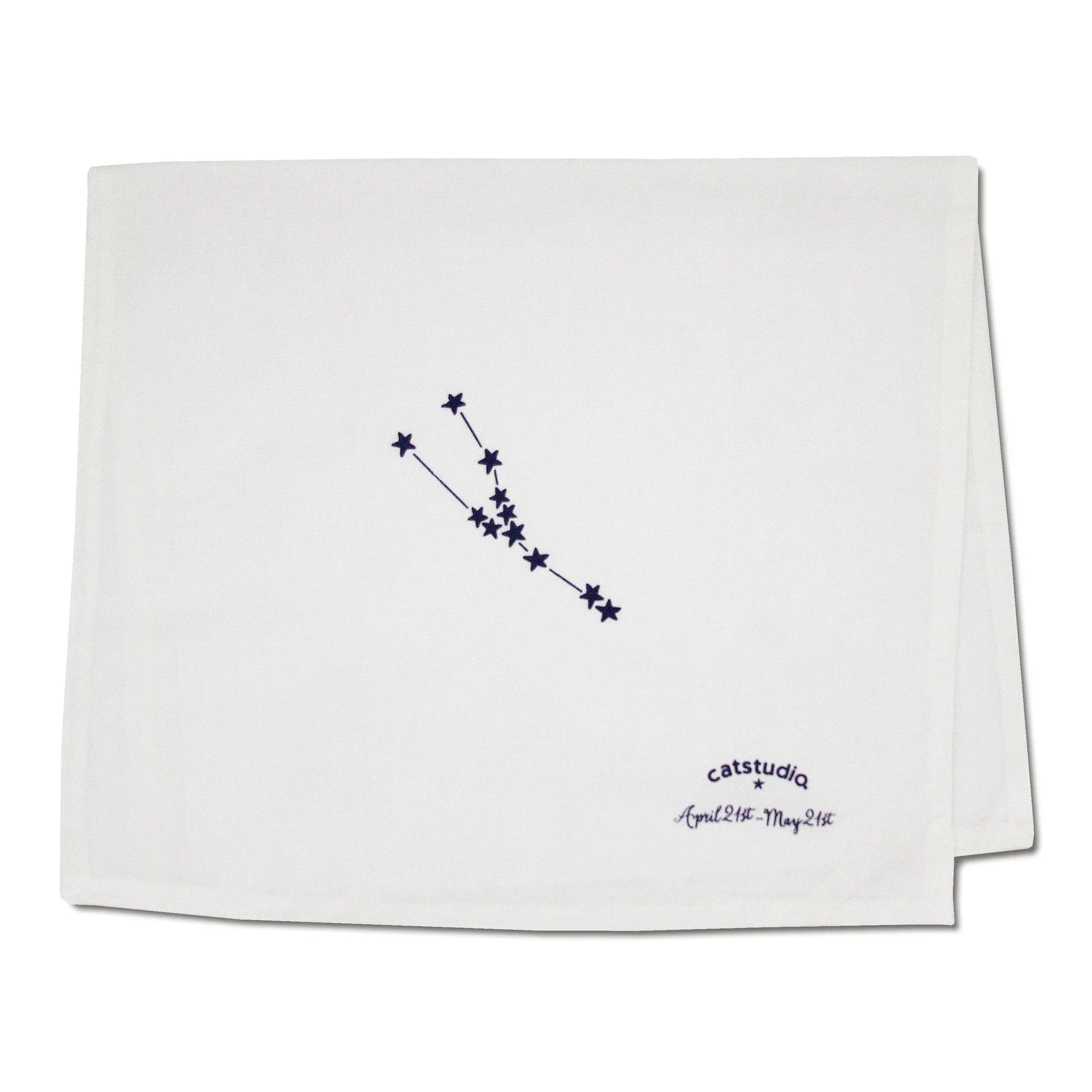 Back of Taurus dish towl with a blue star constellation design and 'catstudio' branding on a white background