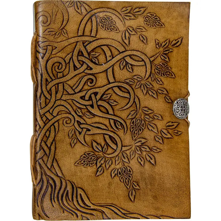 Brown leather Tree of LIfe journal with intricate tree of life design and metal clasp on a white background